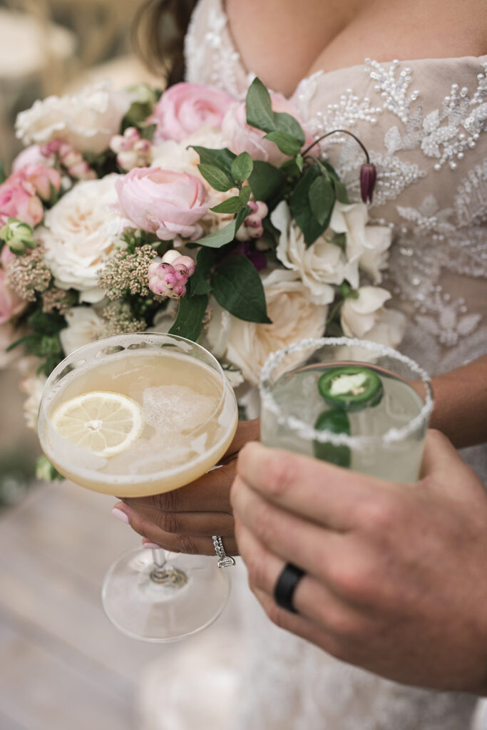Matias Ezcurra Photography, Bride and groom holding wedding cocktails, Bozeman Montana wedding.