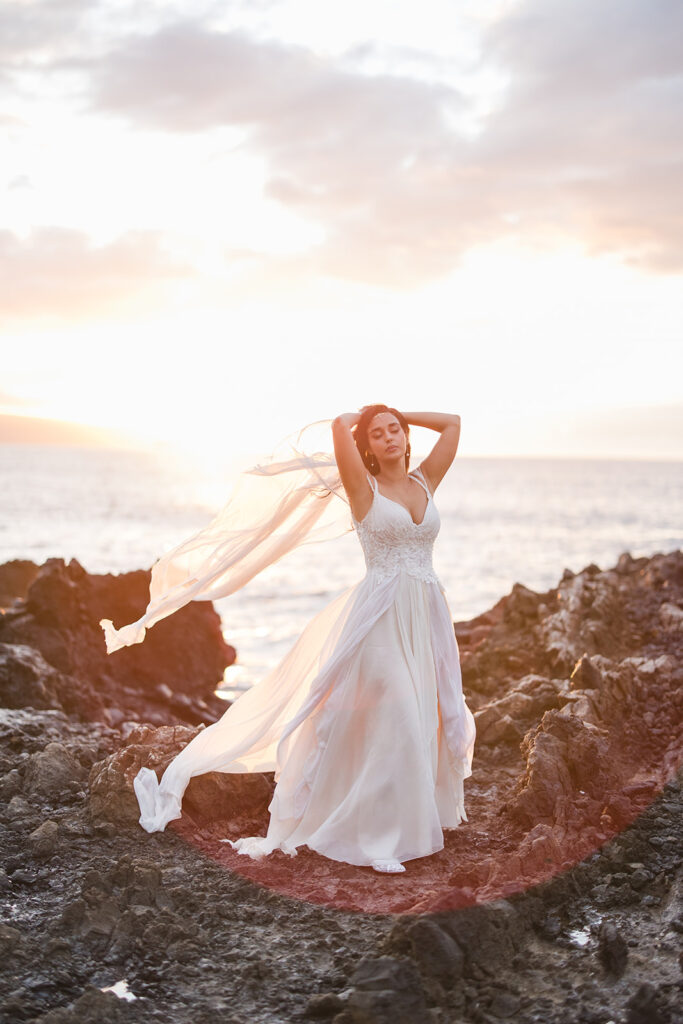 Matias Ezcurra Photography, Bride in flowing gown on Maui beach at sunset, luxury wedding venue
