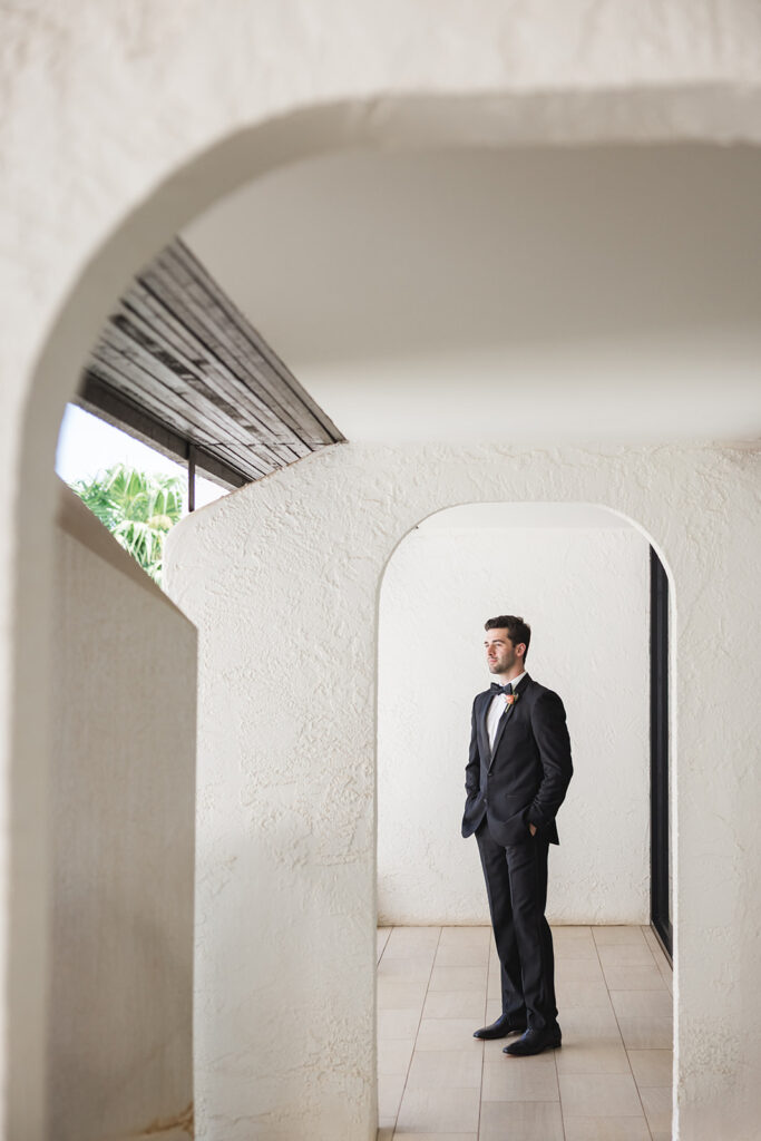 Matias Ezcurra Photography, Groom in a tuxedo at a luxury Maui wedding venue