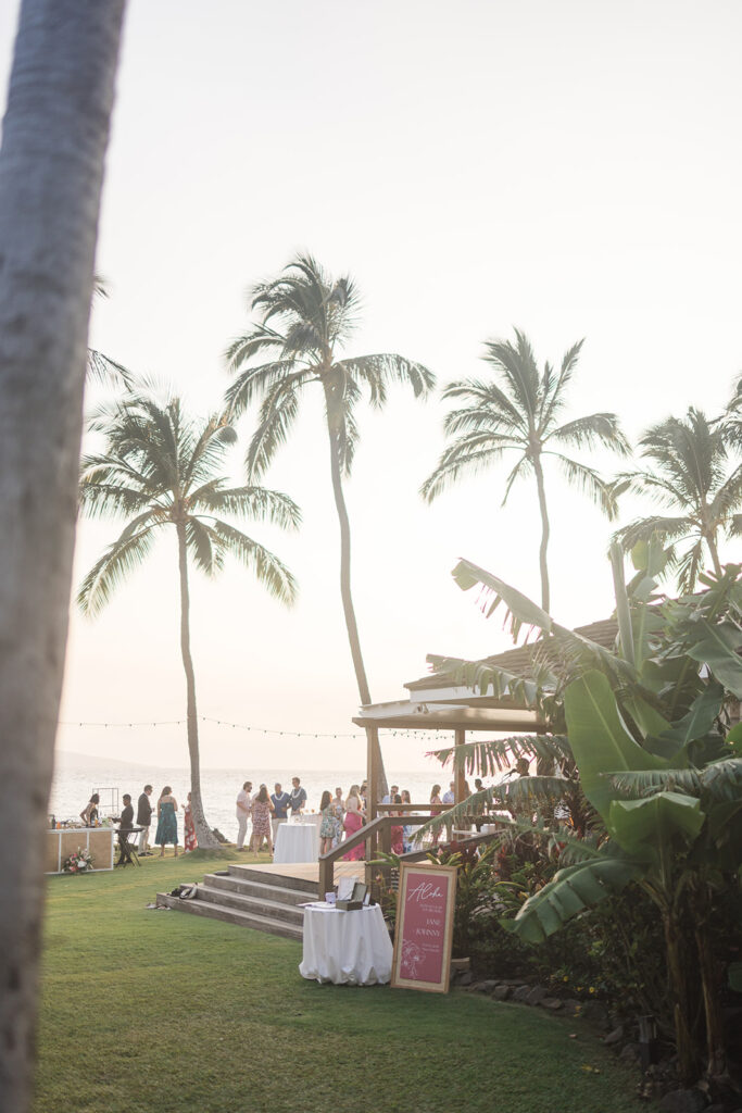 Matias Ezcurra Photography, Aloha wedding sign at a luxury Maui wedding venue with palm trees.