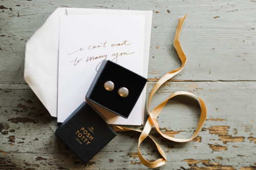 Matias Ezcurra Photography, Wedding earrings in a box next to a note that says "I can't wait to marry you.