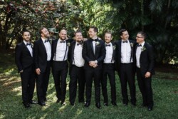Matias Ezcurra Photography, Groom and groomsmen in black tuxedos at Haiku Mill wedding.