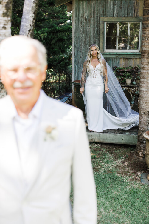 Matias Ezcurra Photography, Bride in wedding dress reveals herself to her father at Haiku Mill wedding.