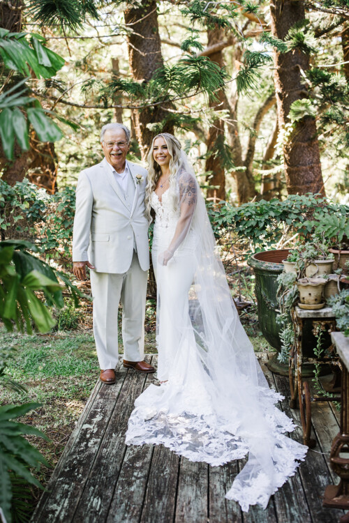 Matias Ezcurra Photography, Bride and father at Haiku Mill wedding. She wears a lace wedding gown and veil.