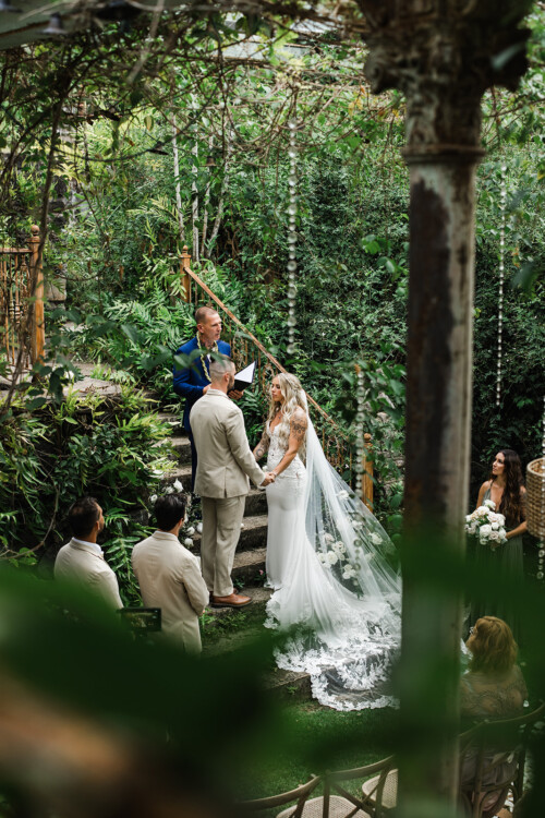 Matias Ezcurra Photography, Bride and groom exchange vows at their Haiku Mill wedding ceremony.