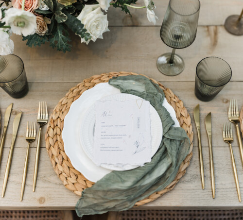Matias Ezcurra Photography, Elegant place setting with gold cutlery, woven charger, and menu for Jessica & Mike's Haiku Mill wedding.
