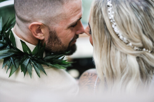 Matias Ezcurra Photography, Close-up of a bride and groom about to kiss at their Haiku Mill wedding.