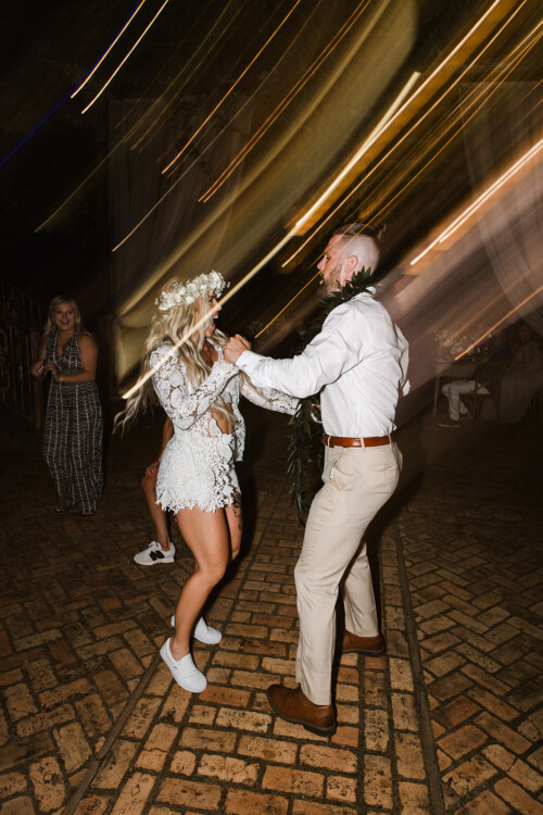Matias Ezcurra Photography, Bride and groom dancing at their Haiku Mill wedding reception.
