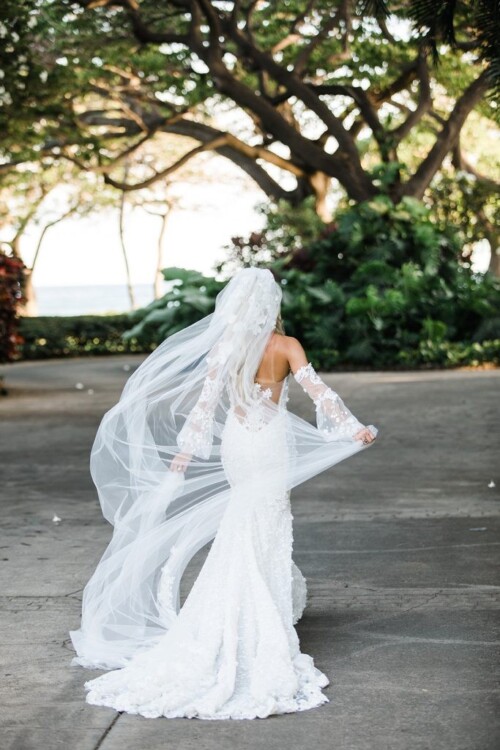 Matias Ezcurra Photography, Bride in flowing wedding dress and veil at Olowalu Plantation wedding