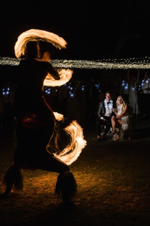 Matias Ezcurra Photography, Fire dancer performs at Brooke + Sam's Olowalu Plantation wedding reception.