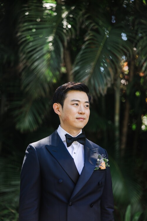 Matias Ezcurra Photography, Groom in navy blue double-breasted tuxedo, smiling