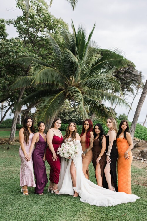 Matias Ezcurra Photography, Bride and bridesmaids in colorful dresses at Olowalu Plantation House wedding.