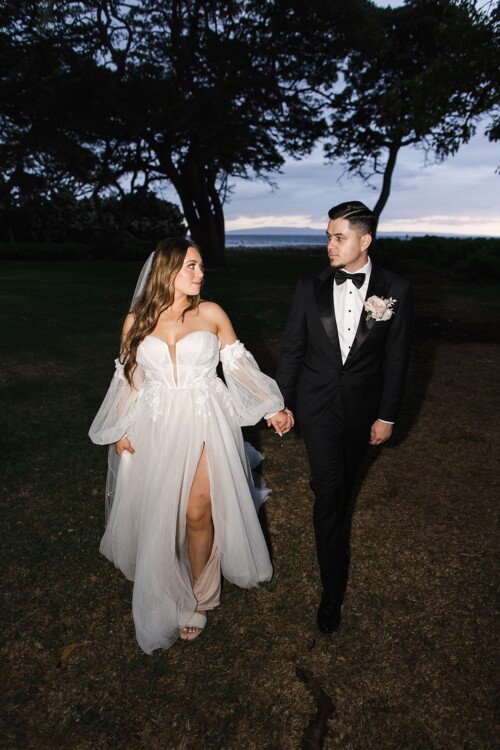 Matias Ezcurra Photography, Happy couple, Devan & David, holding hands at their Olowalu Plantation House wedding.