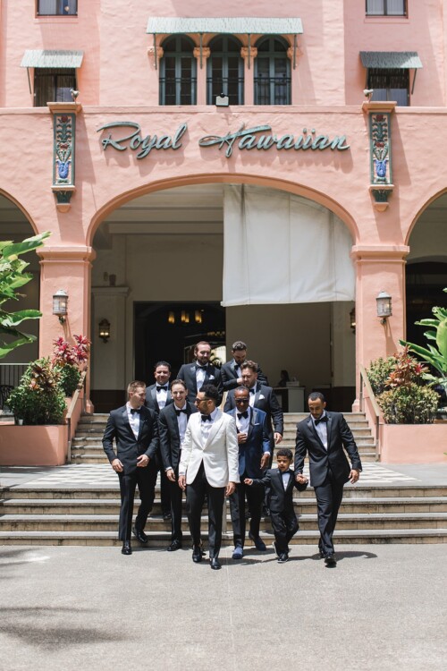 Matias Ezcurra Photography, Groom and groomsmen in tuxedos at the Royal Hawaiian Hotel