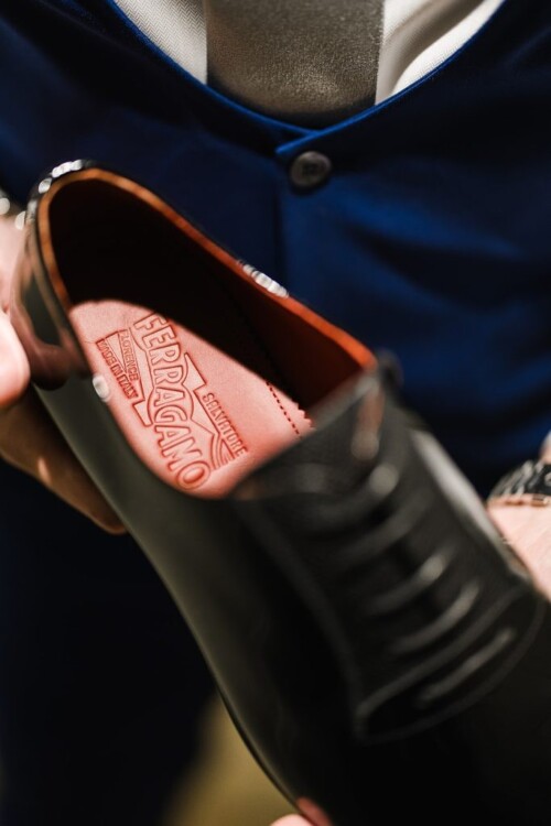 Matias Ezcurra Photography, Close-up of Salvatore Ferragamo shoe's insole, showcasing the brand's logo and "Made in Italy" detail.
