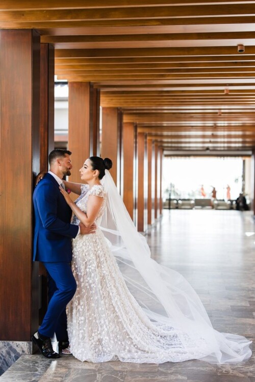 Matias Ezcurra Photography, Bride and groom embrace in elegant Andaz Maui wedding photo.