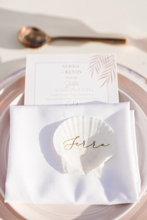 Matias Ezcurra Photography, Elegant wedding place setting with seashell place card reading "Ferrea" for Serra & Kevin's Andaz Maui wedding.