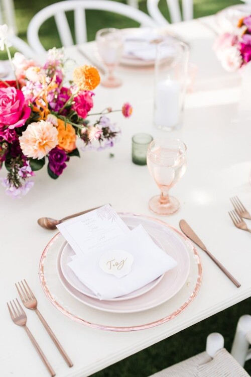 Matias Ezcurra Photography, Elegant wedding place setting with rose gold cutlery, blush plates, and a menu for Serra & Kevin's Andaz Maui wedding.
