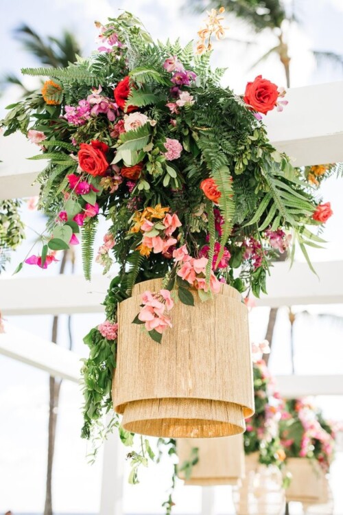 Matias Ezcurra Photography, Floral wedding installation with hanging lanterns at Andaz Maui wedding.